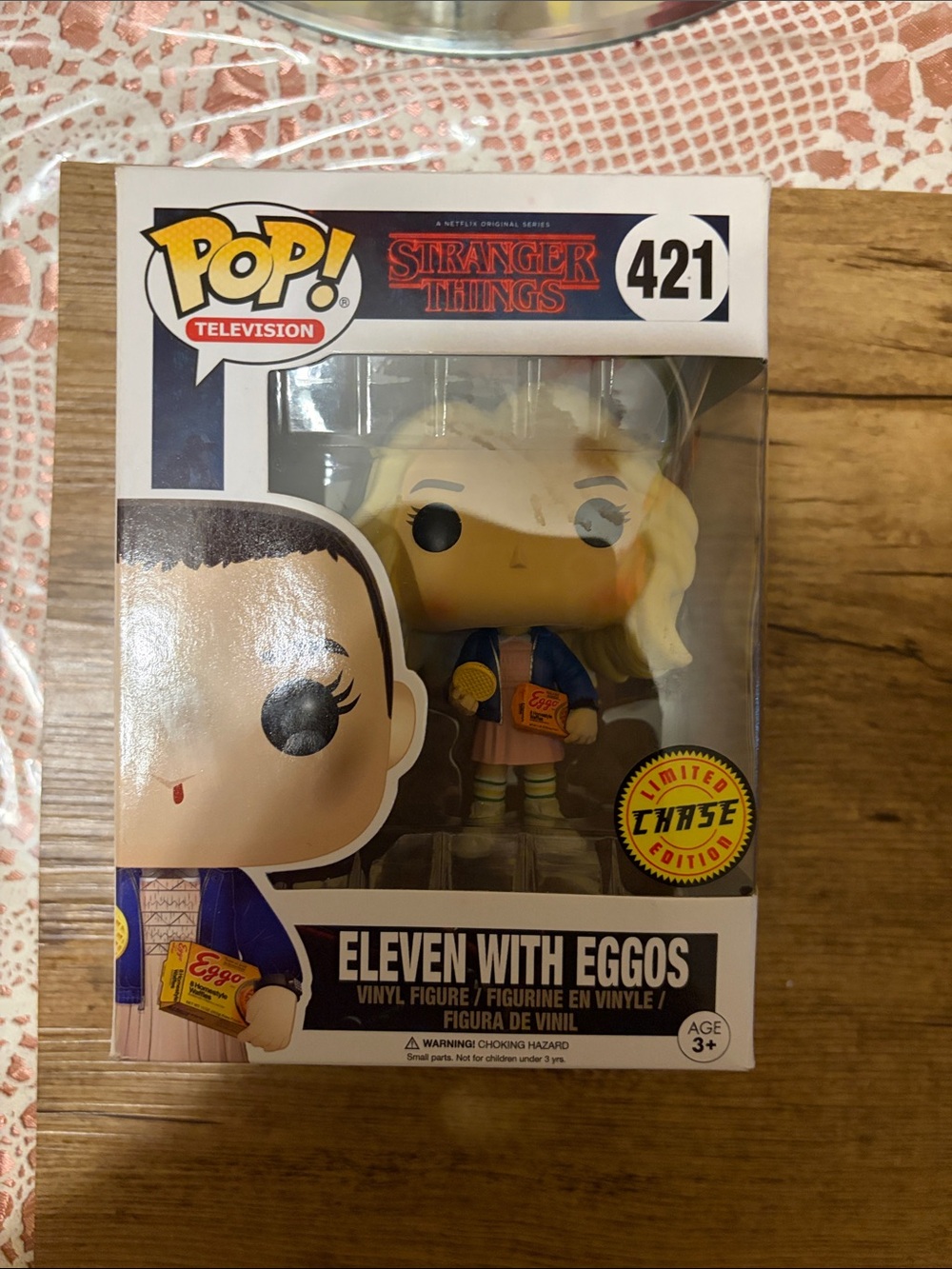 Funko Eleven with Eggos - blue jacket, pink dress, yellow hair